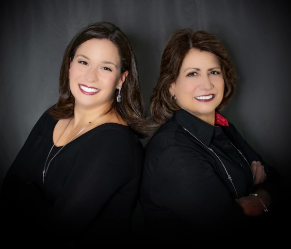 Mechanicsville dentists Dr. Gina McCray and Dr. Kara McCray Demer.