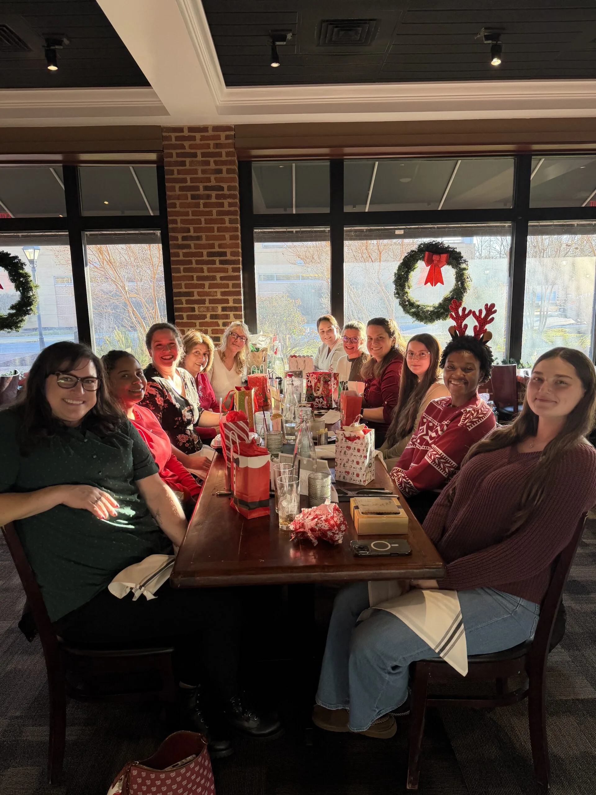 St. Mary’s Dental team enjoying a holiday lunch together at a local restaurant.